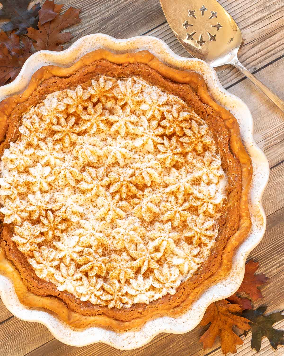 Overhead of Pumpkin Chiffon Pie with pie server on the side