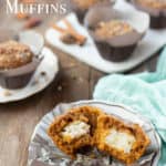 Pumpkin Cream Cheese Muffins with one split apart to show filling