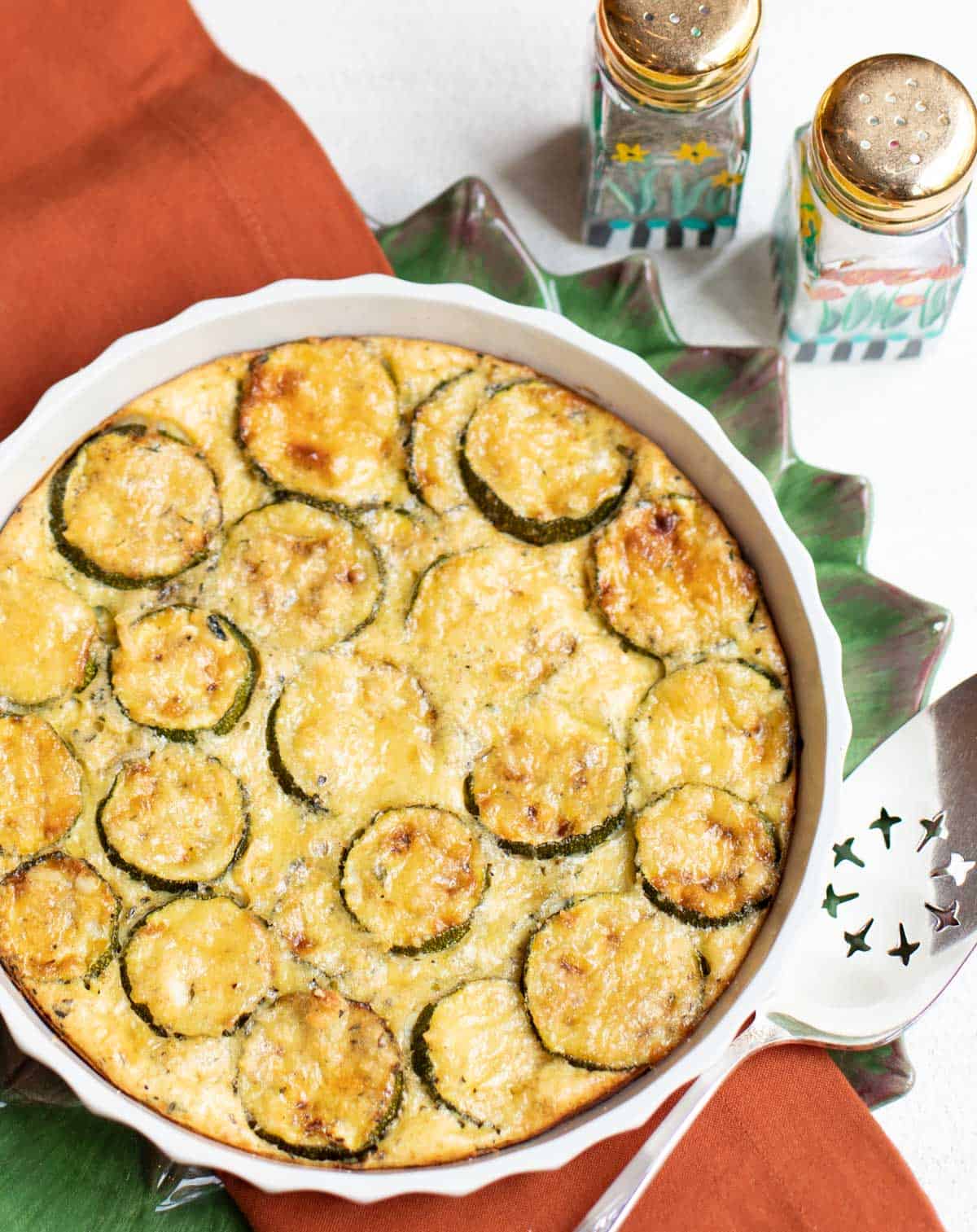 Round baking dish with a zucchini custard