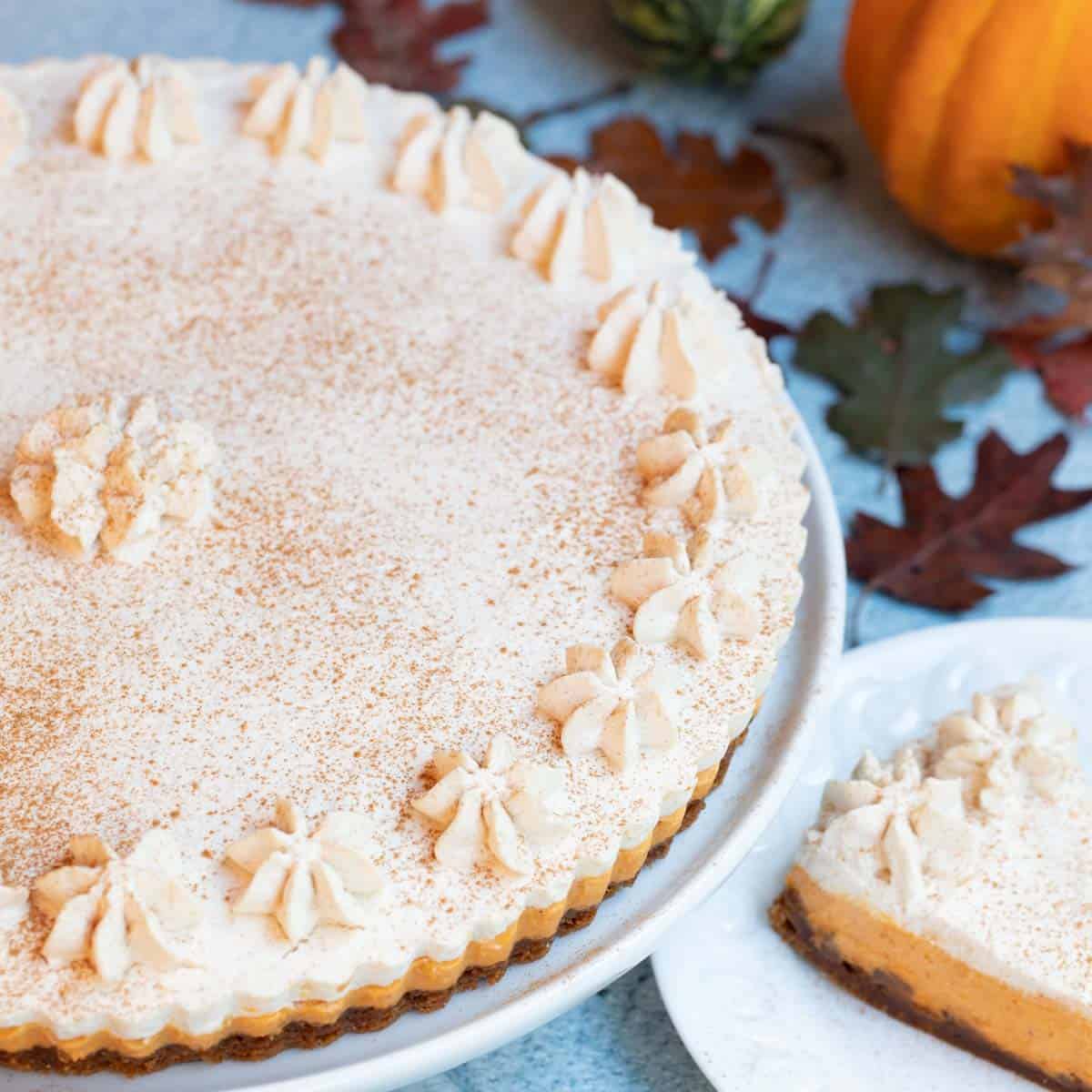 overhead shot of Rum Pumpkin Tart with a slice on the side