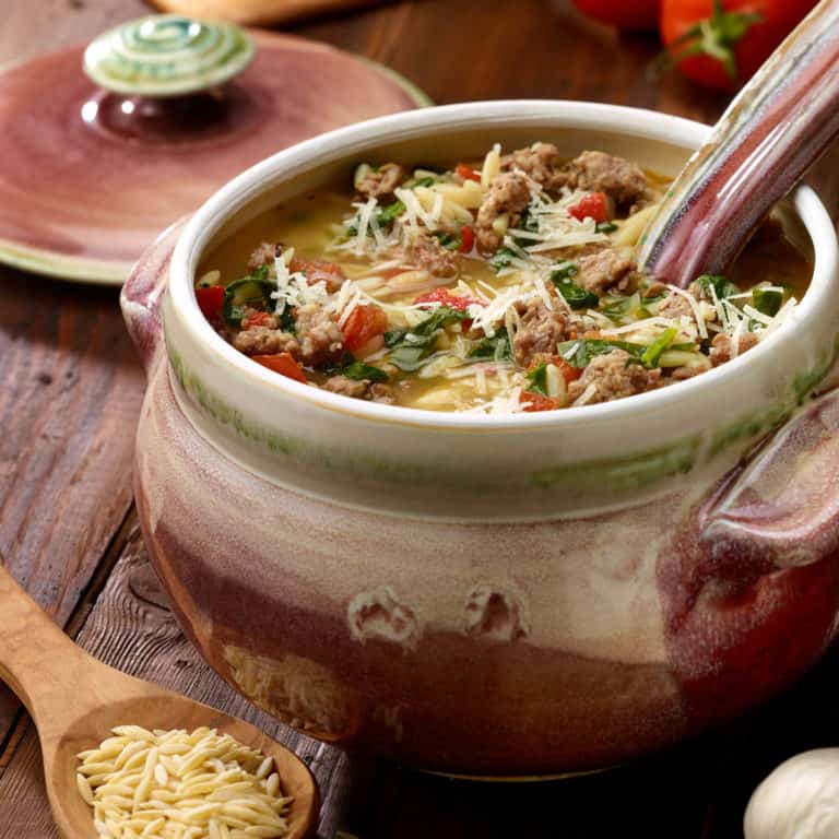 ceramic soup turreen filled with Sausage, Spinach and Orzo soup