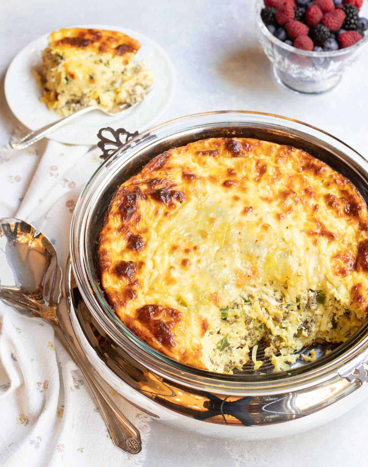 round casserole dish of Sausage, Cheese and Hash Brown Strata