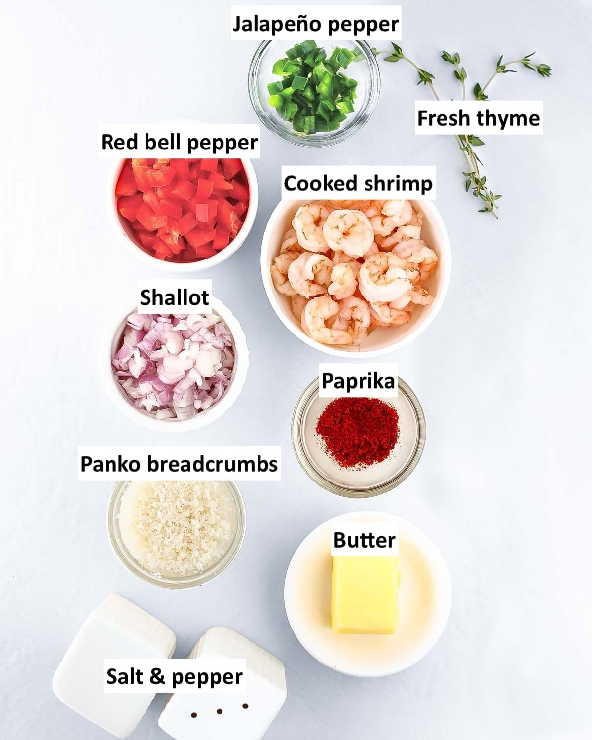 Ingredients to make spicy shrimp salad on a table.