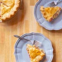 OVerhead showing two slices of Southern Tomato PIe, with rest of pie partially shown on the left