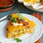 white plate with a slice of Crustless Southwestern Chicken Pie
