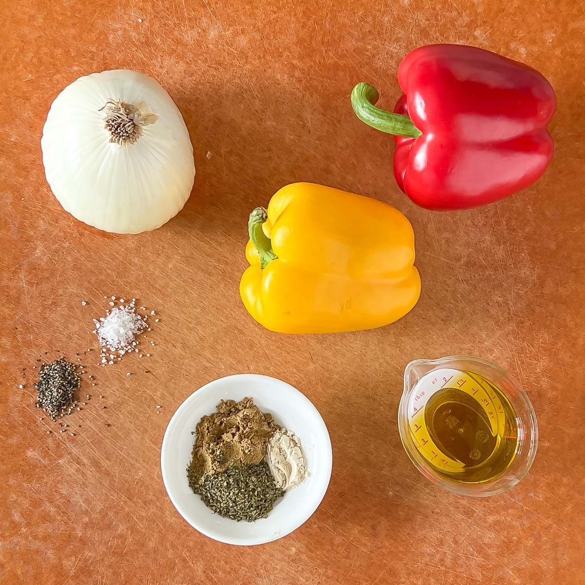 Ingredients to make the seasoned peppers and onion for Mexican Grilled Chicken.
