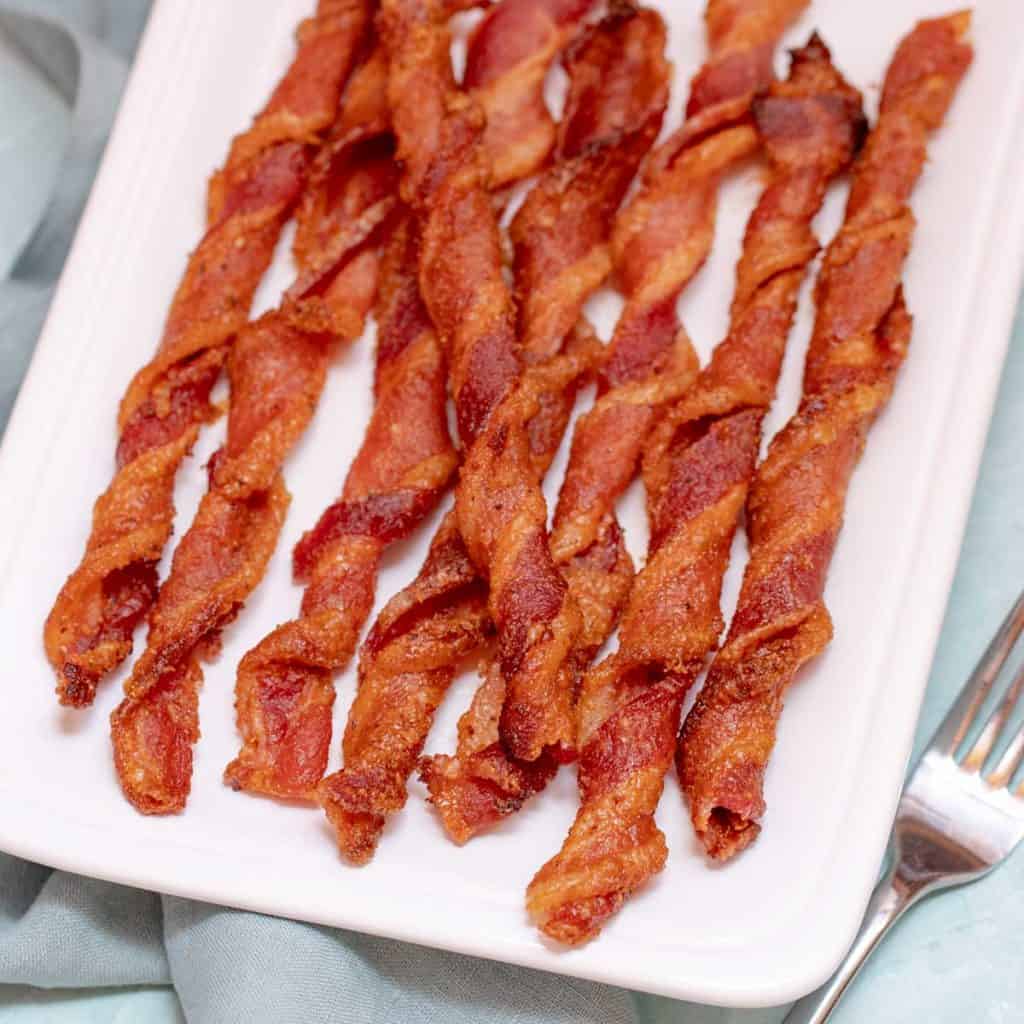 white platter showing cooked Spiced Bacon Twists