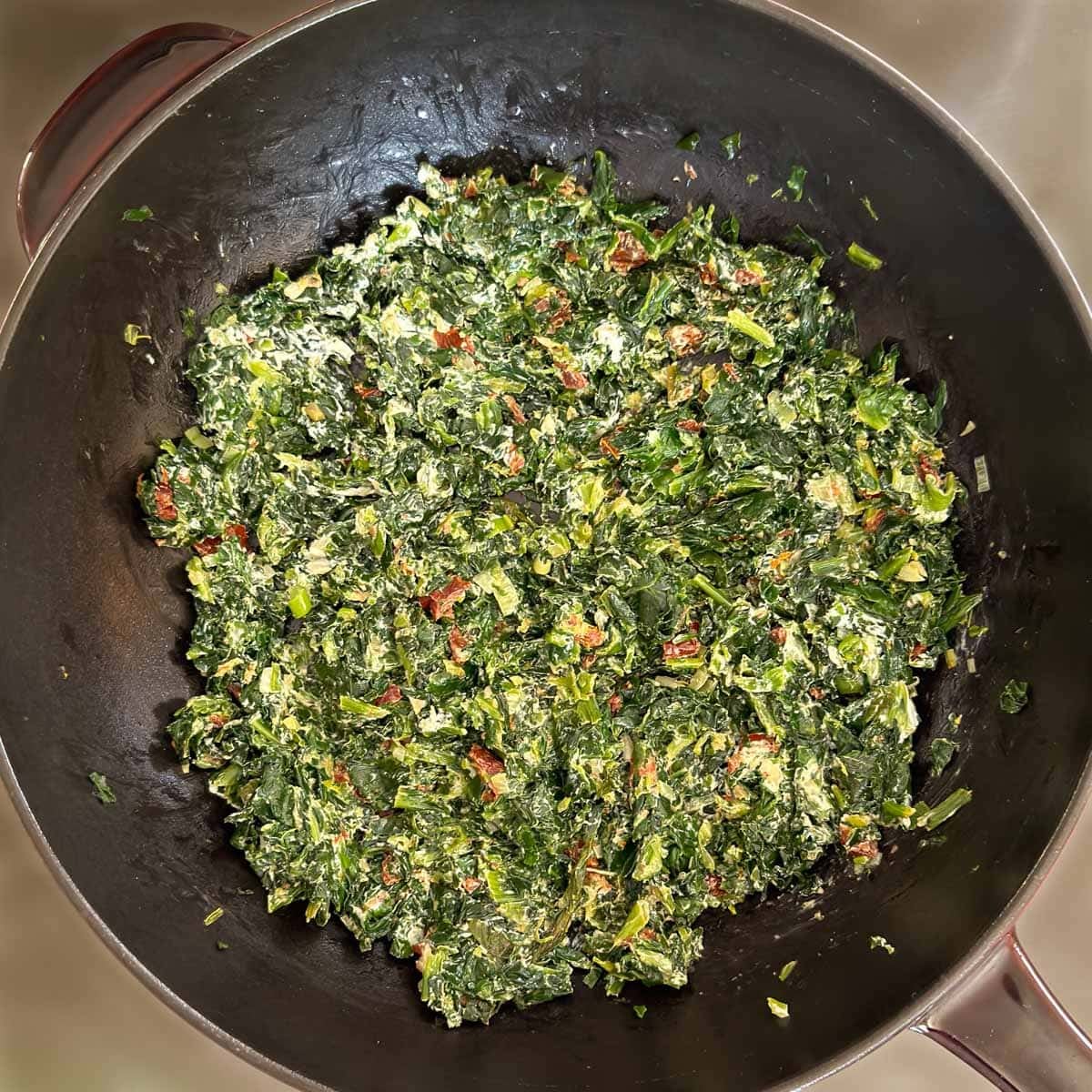 Spinach stuffing with goat cheese stirred in and melted.