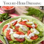 Round green plate filled with Tomato Cucumber Salad with Yogurt-Herb Dressing