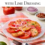 Round white plate filled with Tomato Peach Salad with Lime Dressing