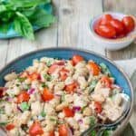 blue bowl filled with Tuna, White Bean and Tomato Salad