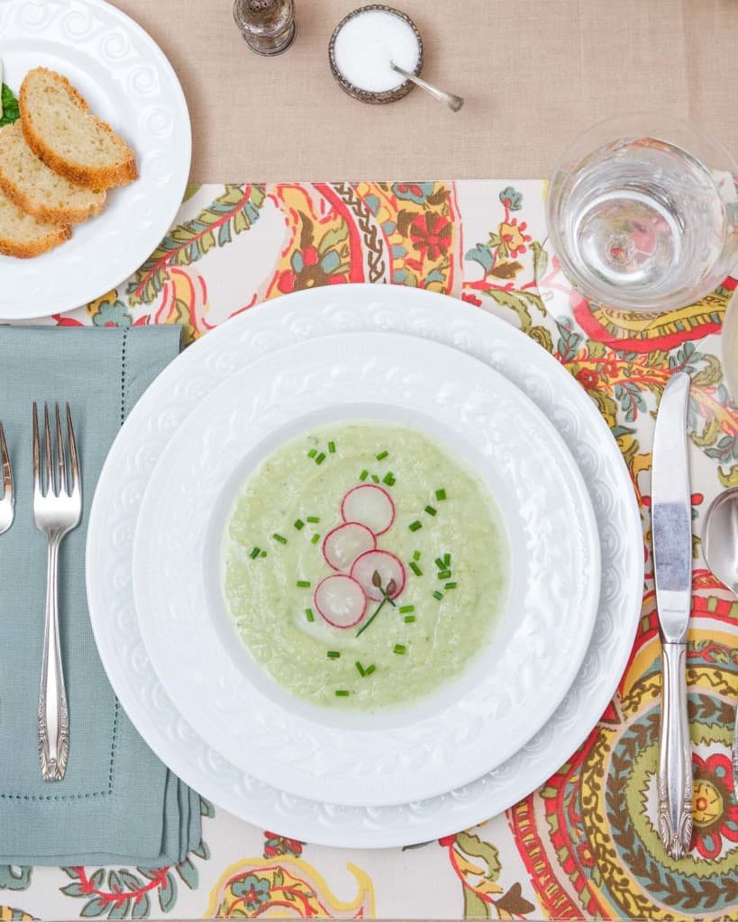 overhead shot showing how to serve vichyssoise soup as a first course