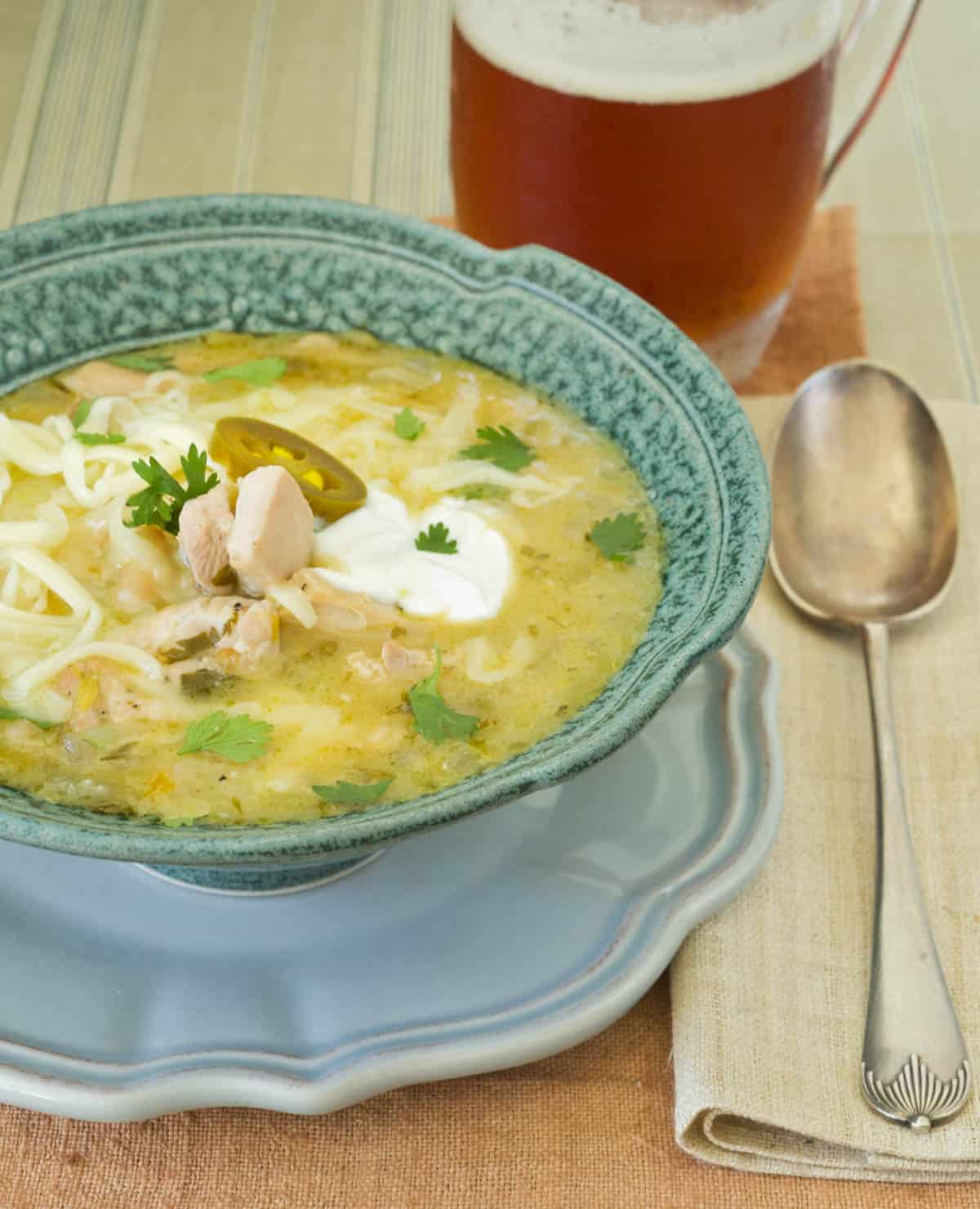 Blue bowl flled with White Bean and Chicken Chili